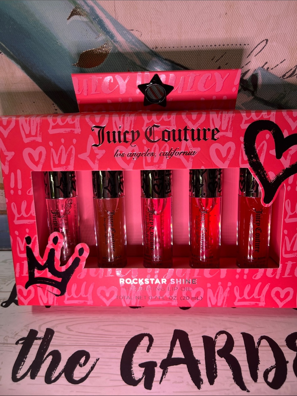 Juicy Couture Lip Gloss Set in Pink and Red Tones